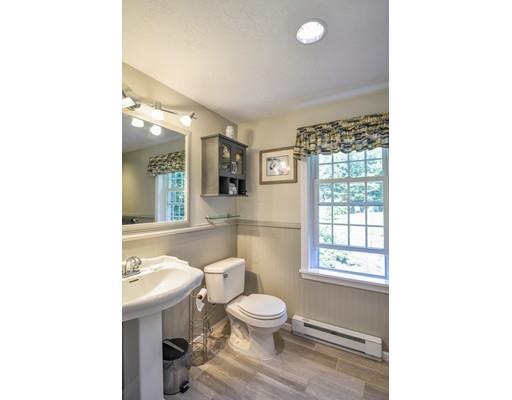 406 Sterling Road Holden, MA 01522 - Photo 25 of 42 a bathroom with a toilet a sink and a window