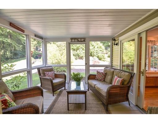 406 Sterling Road Holden, MA 01522 - Photo 30 of 42 a living room with furniture and a floor to ceiling window