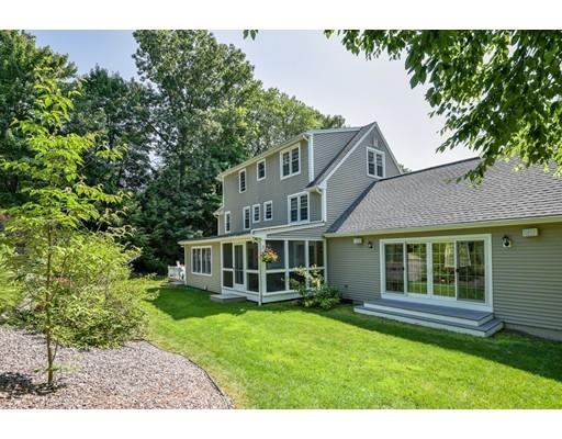 406 Sterling Road Holden, MA 01522 - Photo 31 of 42 a view of a house with a backyard