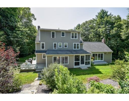 406 Sterling Road Holden, MA 01522 - Photo 32 of 42 a aerial view of a house with a yard and potted plants
