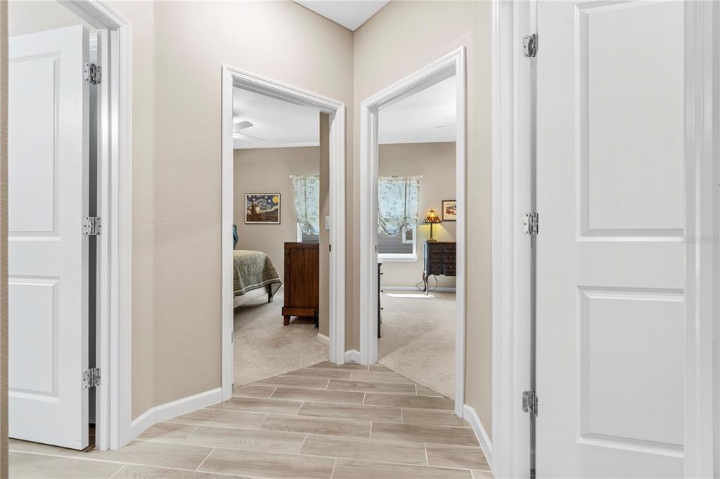 7381 Southwest 78th Terrace Ocala, FL 34474 - Photo 24 of 47 a view of a livingroom from a hallway