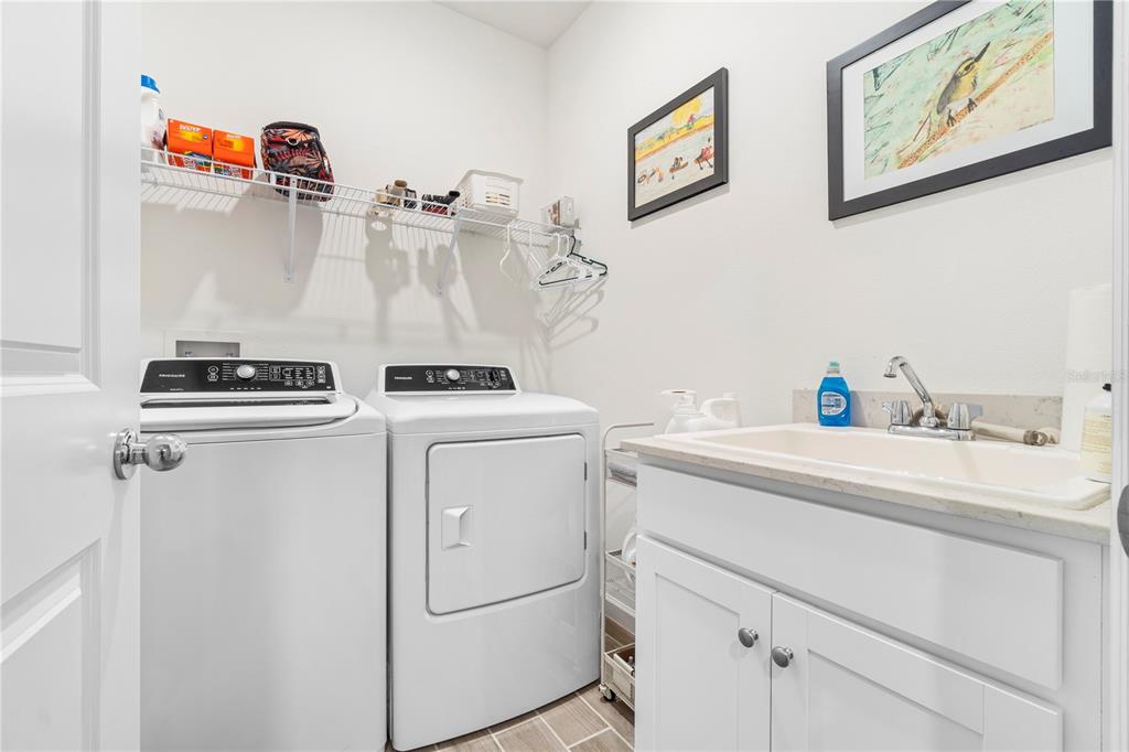 7381 Southwest 78th Terrace Ocala, FL 34474 - Photo 30 of 47 a utility room with dryer and washer