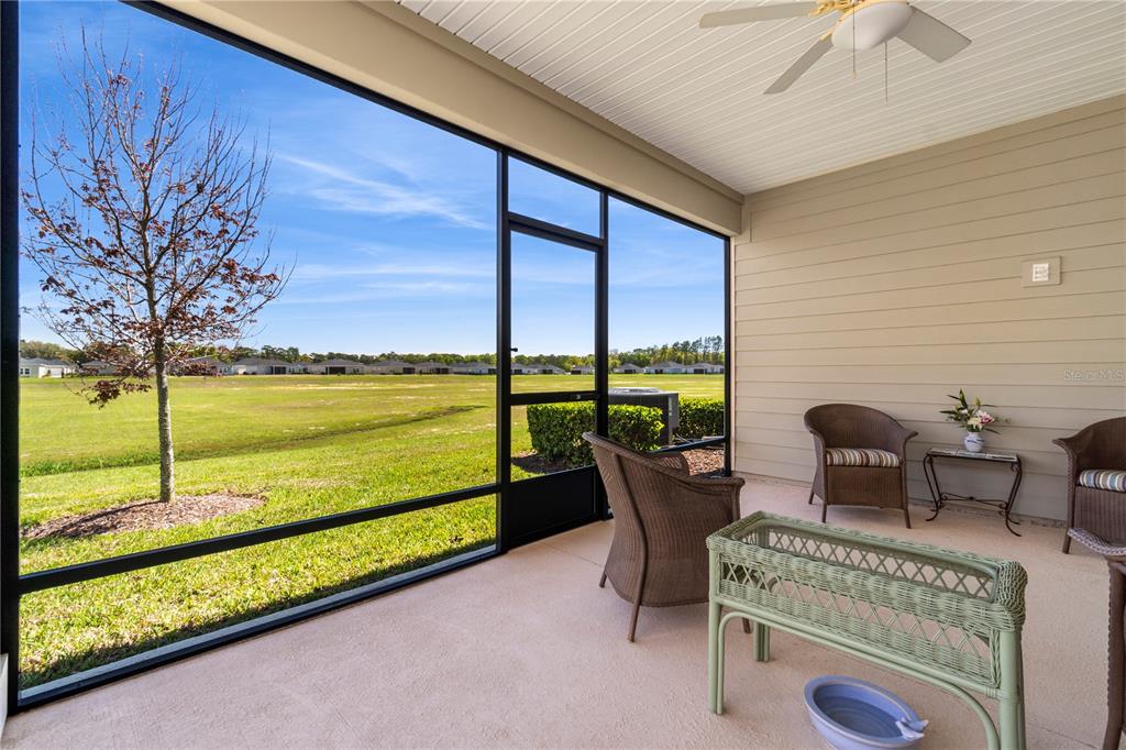7381 Southwest 78th Terrace Ocala, FL 34474 - Photo 31 of 47 a view of a swimming pool with outdoor seating
