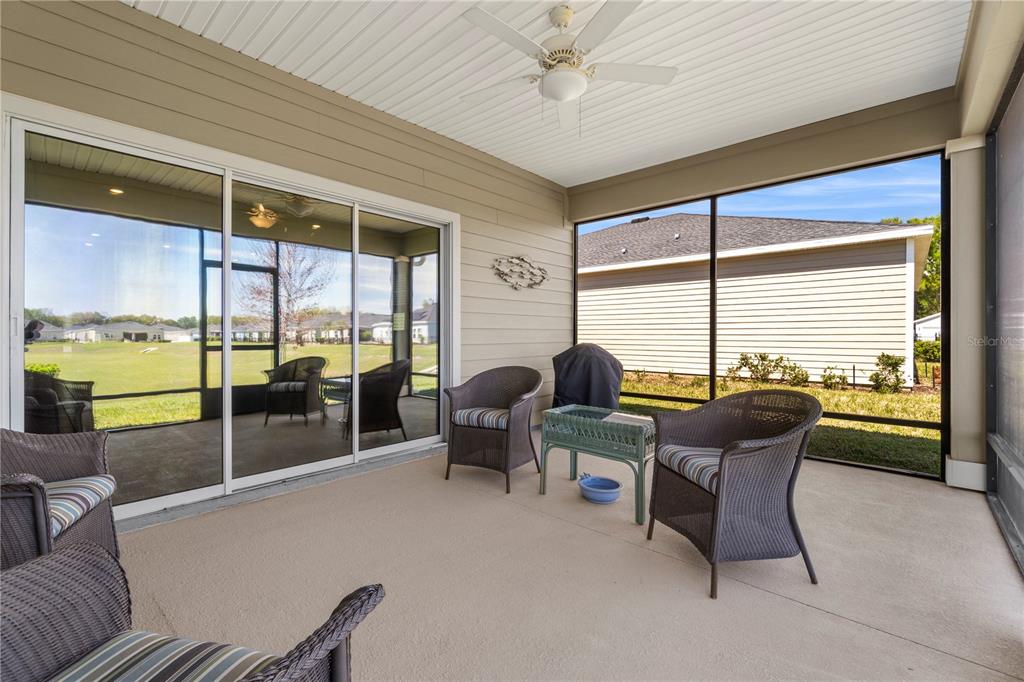 7381 Southwest 78th Terrace Ocala, FL 34474 - Photo 32 of 47 a work room with furniture and large windows