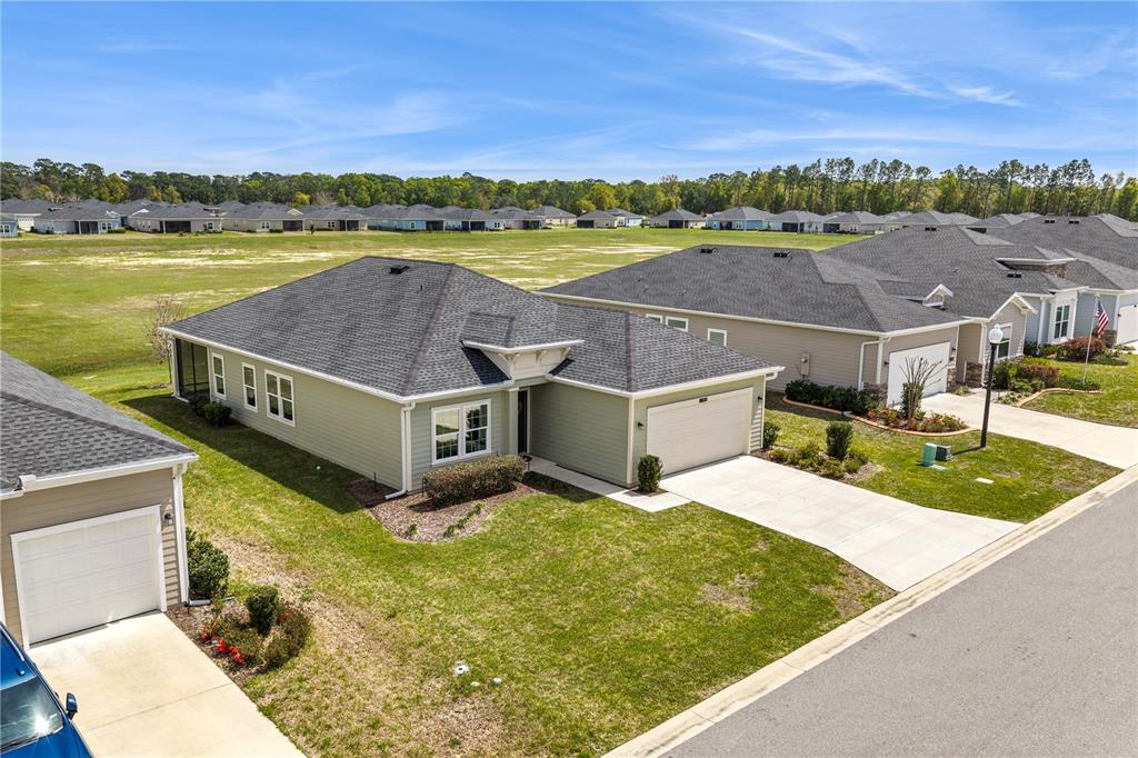 7381 Southwest 78th Terrace Ocala, FL 34474 - Photo 39 of 47 an aerial view of a house with big yard