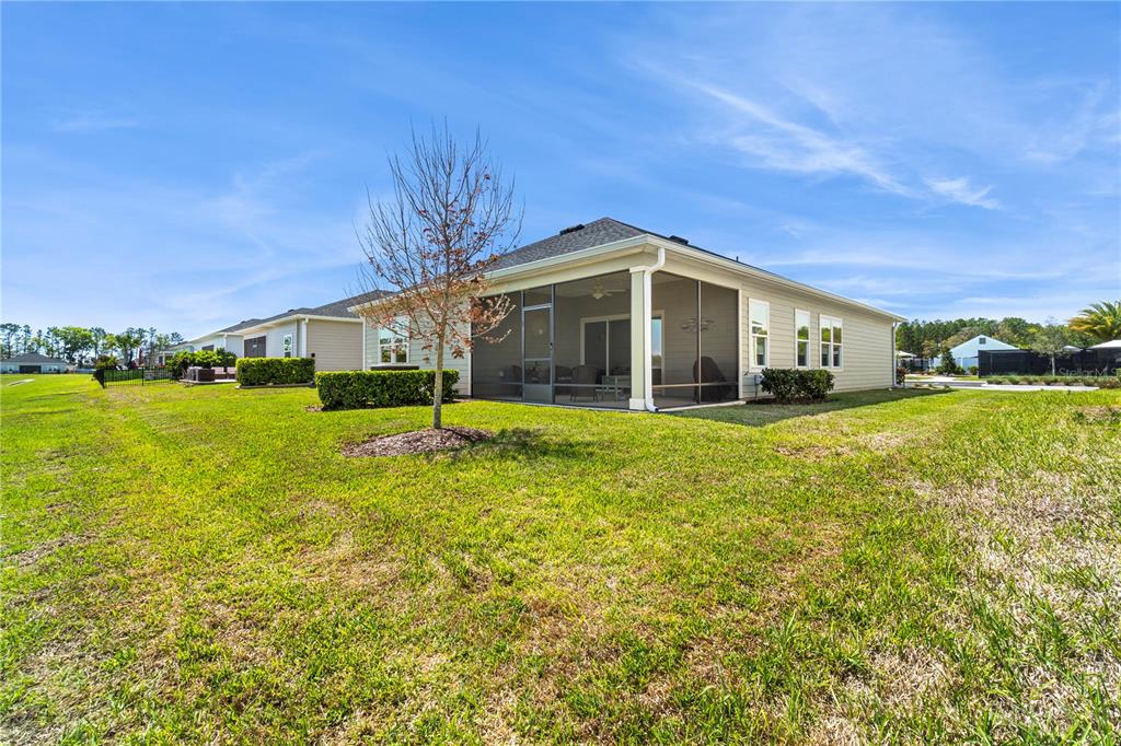 7381 Southwest 78th Terrace Ocala, FL 34474 - Photo 40 of 47 a front view of a house with garden