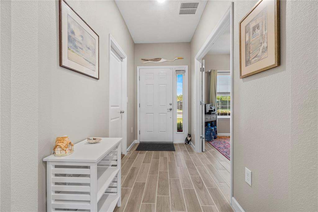 7381 Southwest 78th Terrace Ocala, FL 34474 - Photo 4 of 47 a bathroom with a bathtub and a shower