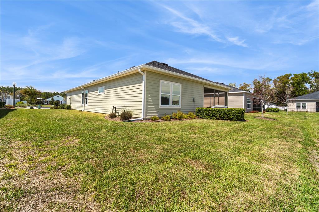 7381 Southwest 78th Terrace Ocala, FL 34474 - Photo 44 of 47 a house view with a garden space