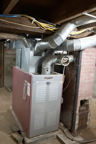 a view of walk in closet and window