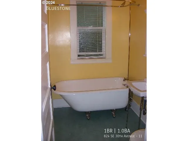 a room with cabinets and wooden floor