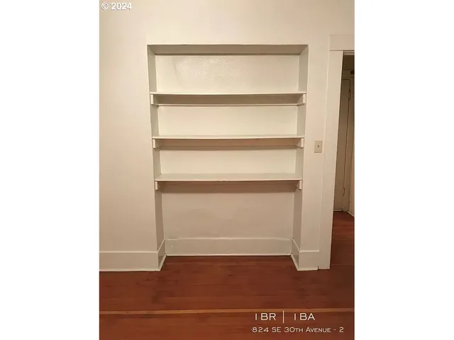 a view of a bedroom with closet area