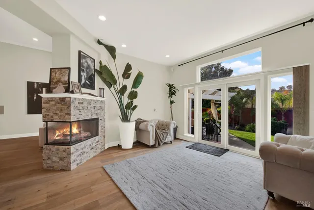 a kitchen with granite countertop a sink and a stove