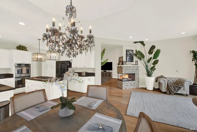 a large bathroom with a double vanity sink a mirror and a bathtub