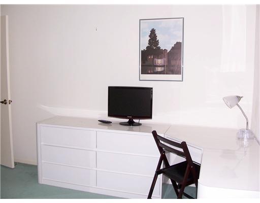 7727 La Mirada Drive, Unit 118 Boca Raton, FL 33433 - Photo 12 of 16 a living room with furniture and a flat screen tv