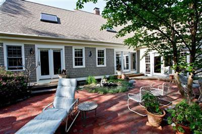 32 Pochet Road Orleans, MA 02653 - Photo 3 of 32 front view of a house with a yard