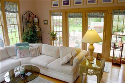 32 Pochet Road Orleans, MA 02653 - Photo 8 of 32 a living room with furniture and a large window