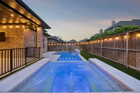 a house view with a garden space