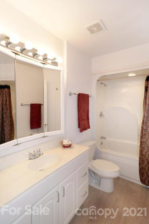 265 Deer Road Salisbury, NC 28146 - Photo 22 of 48 a bathroom with a sink a toilet and shower