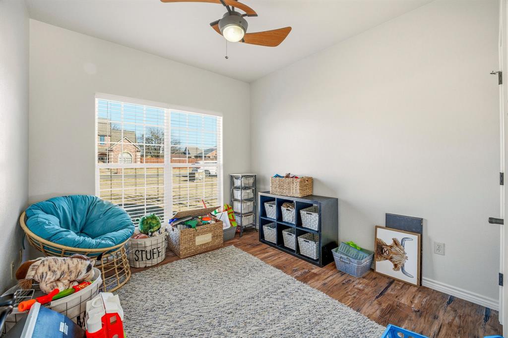1114 Elk Ridge Drive Stephenville, TX 76401 - Photo 19 of 32 a living room with furniture and a window