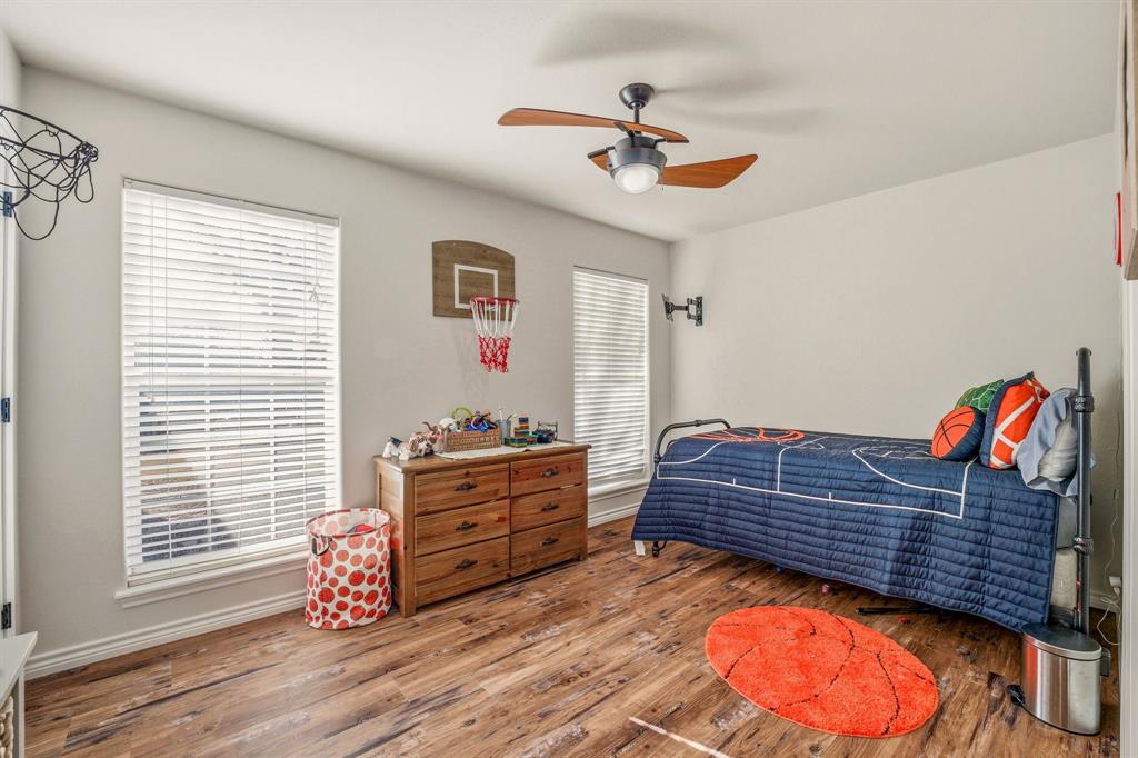 1114 Elk Ridge Drive Stephenville, TX 76401 - Photo 21 of 32 a bed room with a bed and a window