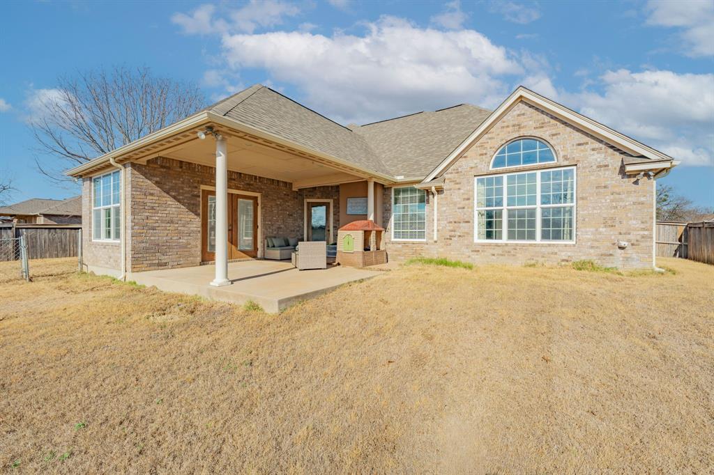 1114 Elk Ridge Drive Stephenville, TX 76401 - Photo 27 of 32 a house view with a outdoor space