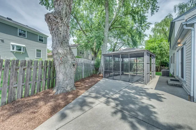 a view of backyard with green space