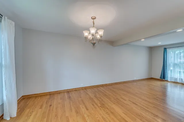 a view of a big room with wooden floor
