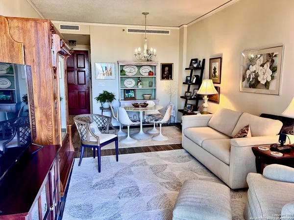 a view of a livingroom with furniture and a couch