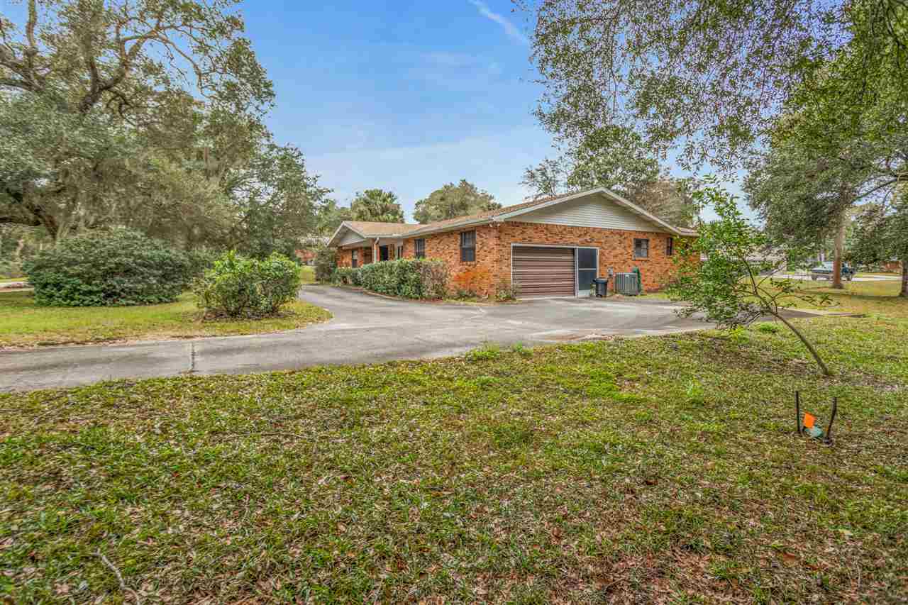 480 Vaill Point Road St. Augustine, FL 32086 - Photo 3 of 11 a house view with a garden space