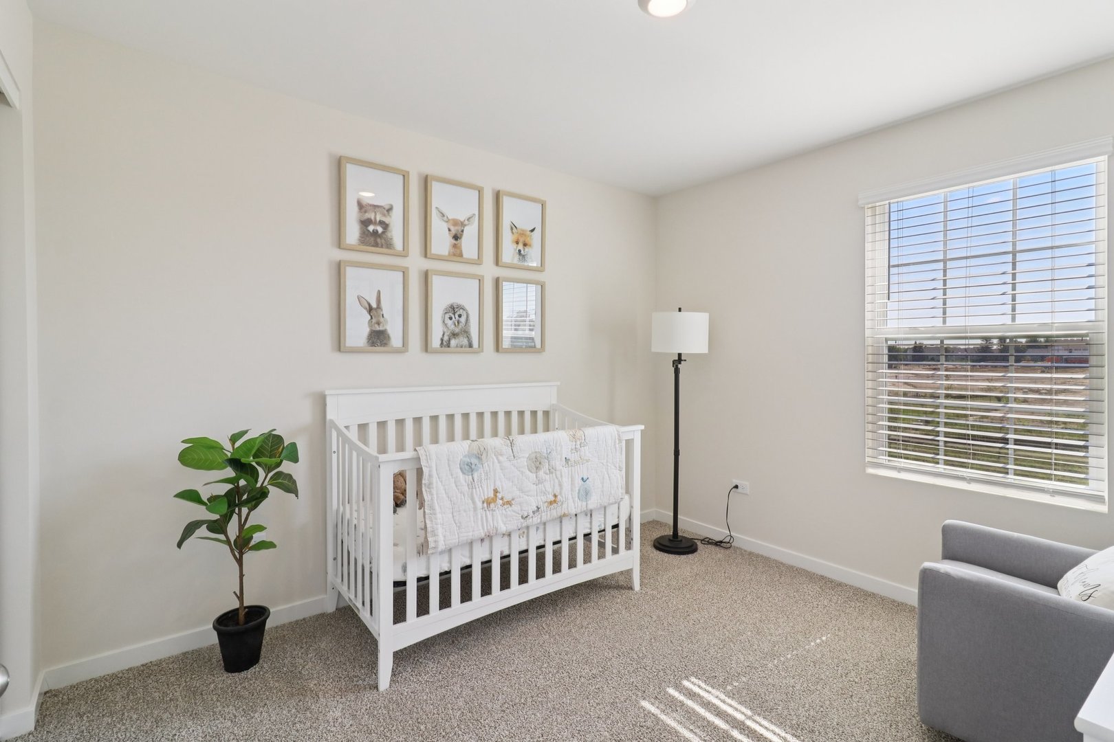 1748 Stable Lane Aurora, IL 60503 - Photo 32 of 34 a bed room with furniture and a window