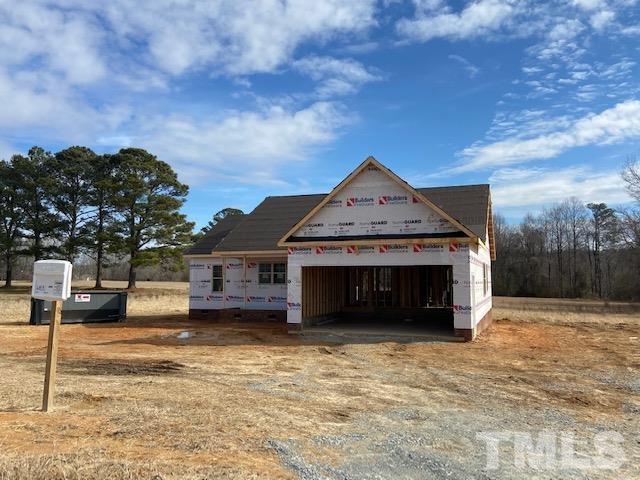 1171 Denning Road Angier, NC 27501 - Photo 2 of 8 a front view of a house with a yard
