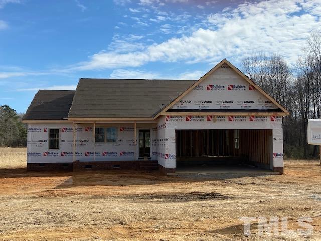 1171 Denning Road Angier, NC 27501 - Photo 3 of 8 a front view of a house with a yard