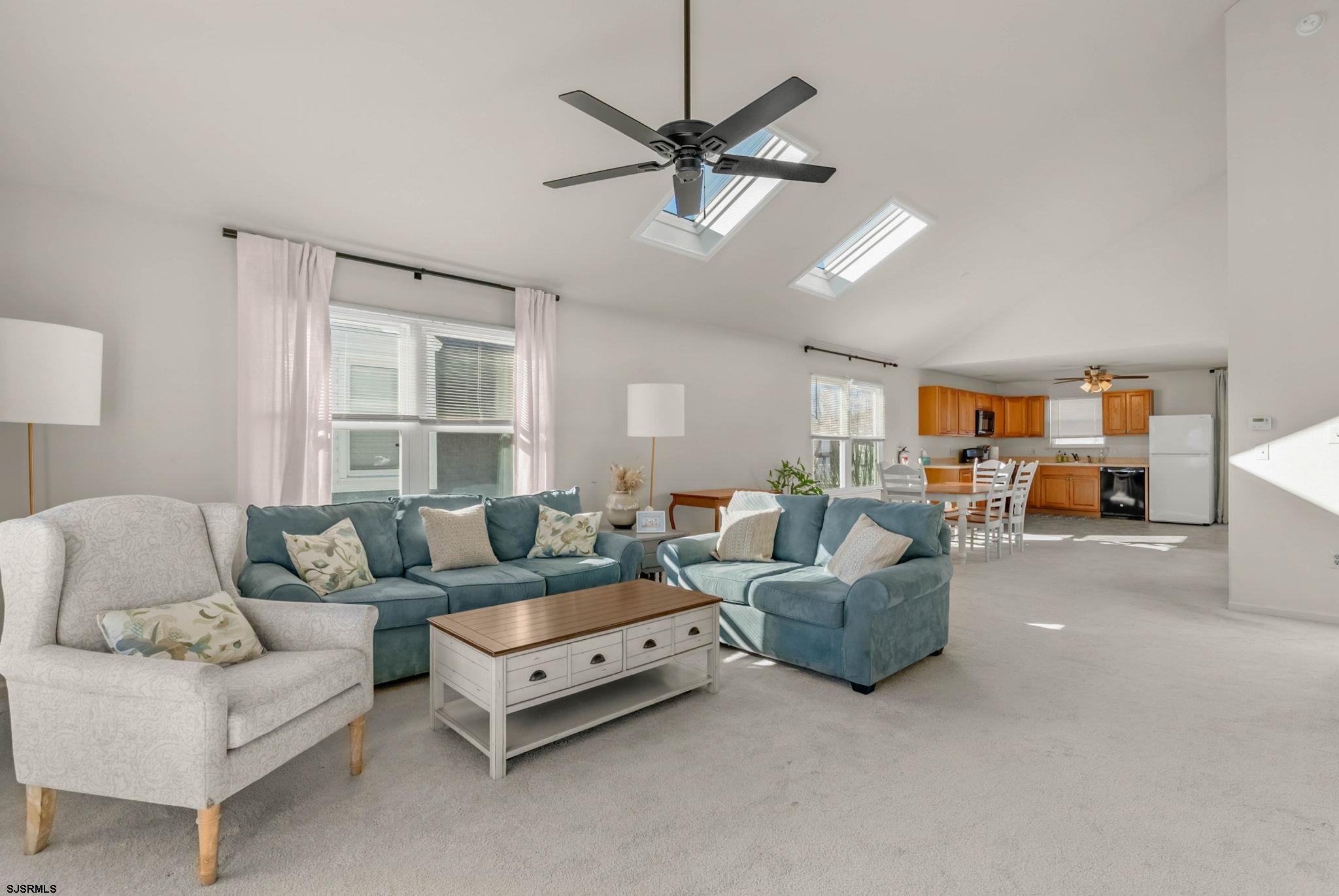 413 West Beach Avenue, Unit B Brigantine, NJ 08203 - Photo 15 of 30 a living room with furniture and a window