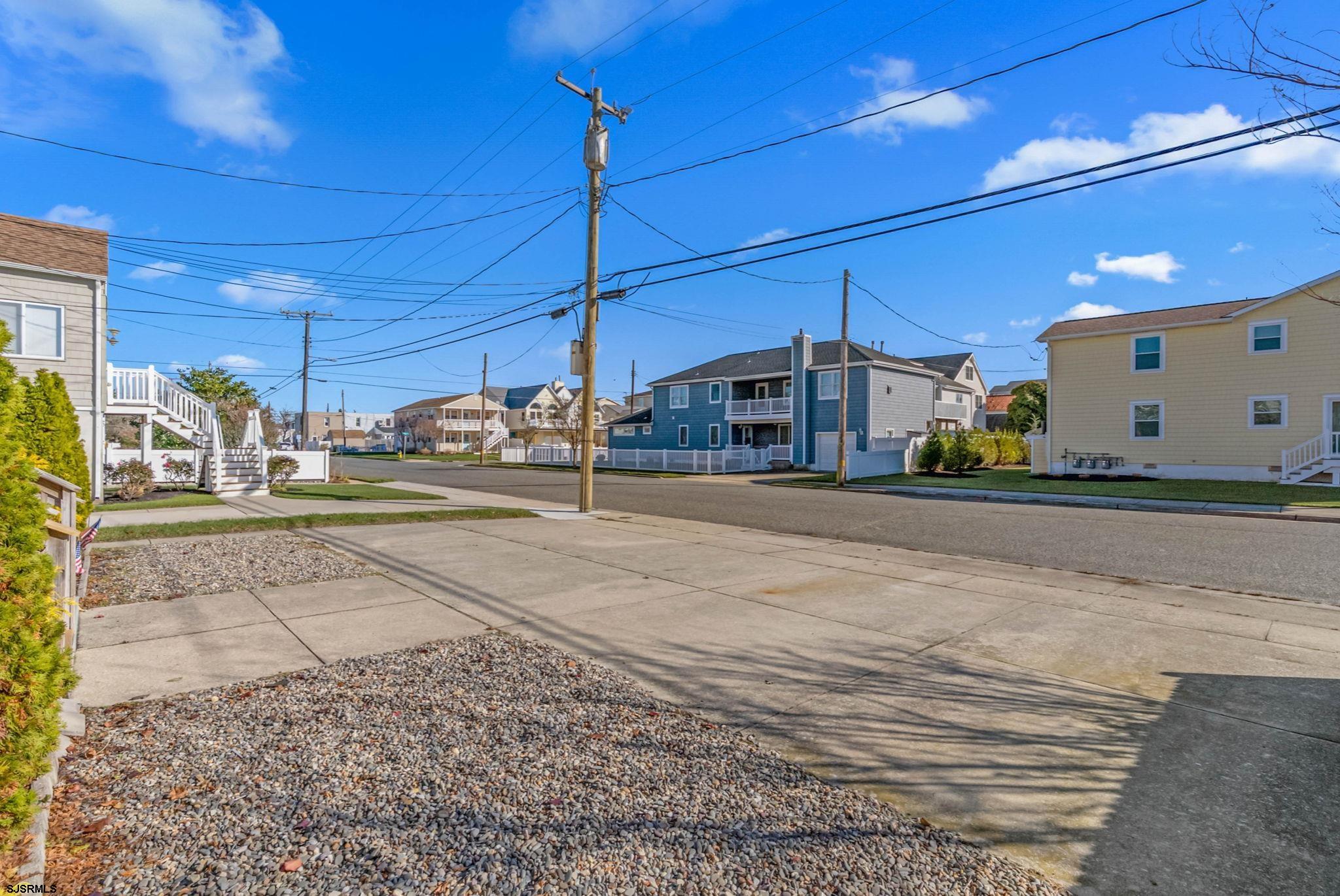 413 West Beach Avenue, Unit B Brigantine, NJ 08203 - Photo 3 of 30 a view of a building with a street