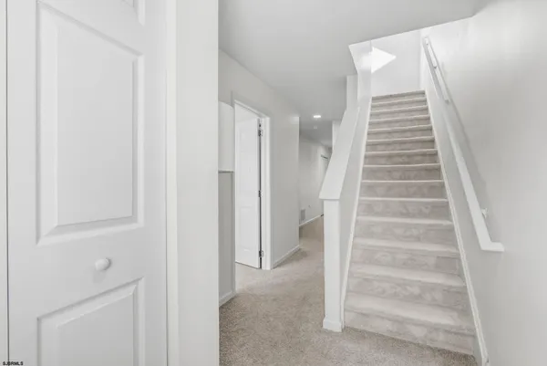 a view of an entryway with staircase