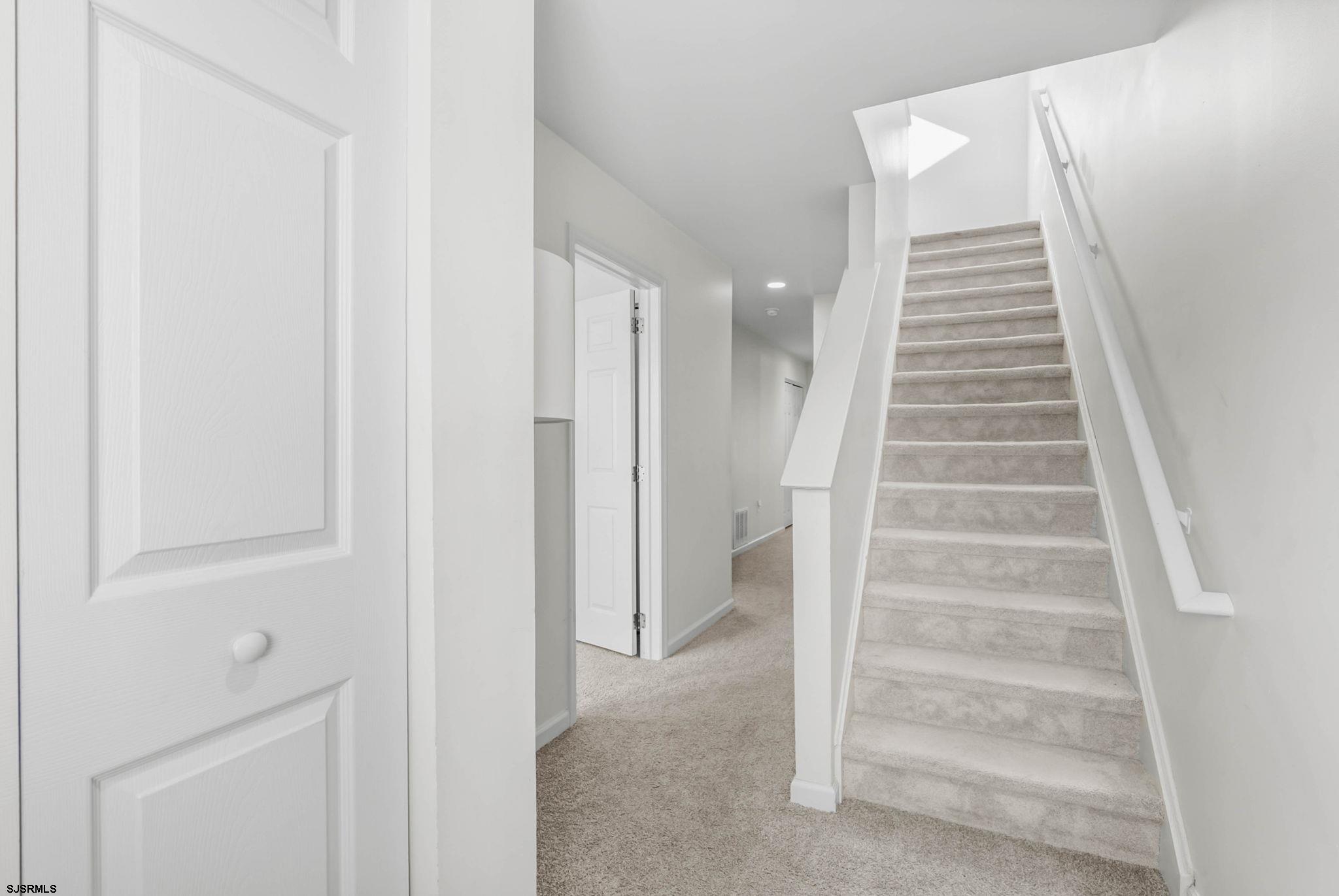 413 West Beach Avenue, Unit B Brigantine, NJ 08203 - Photo 5 of 30 a view of an entryway with staircase