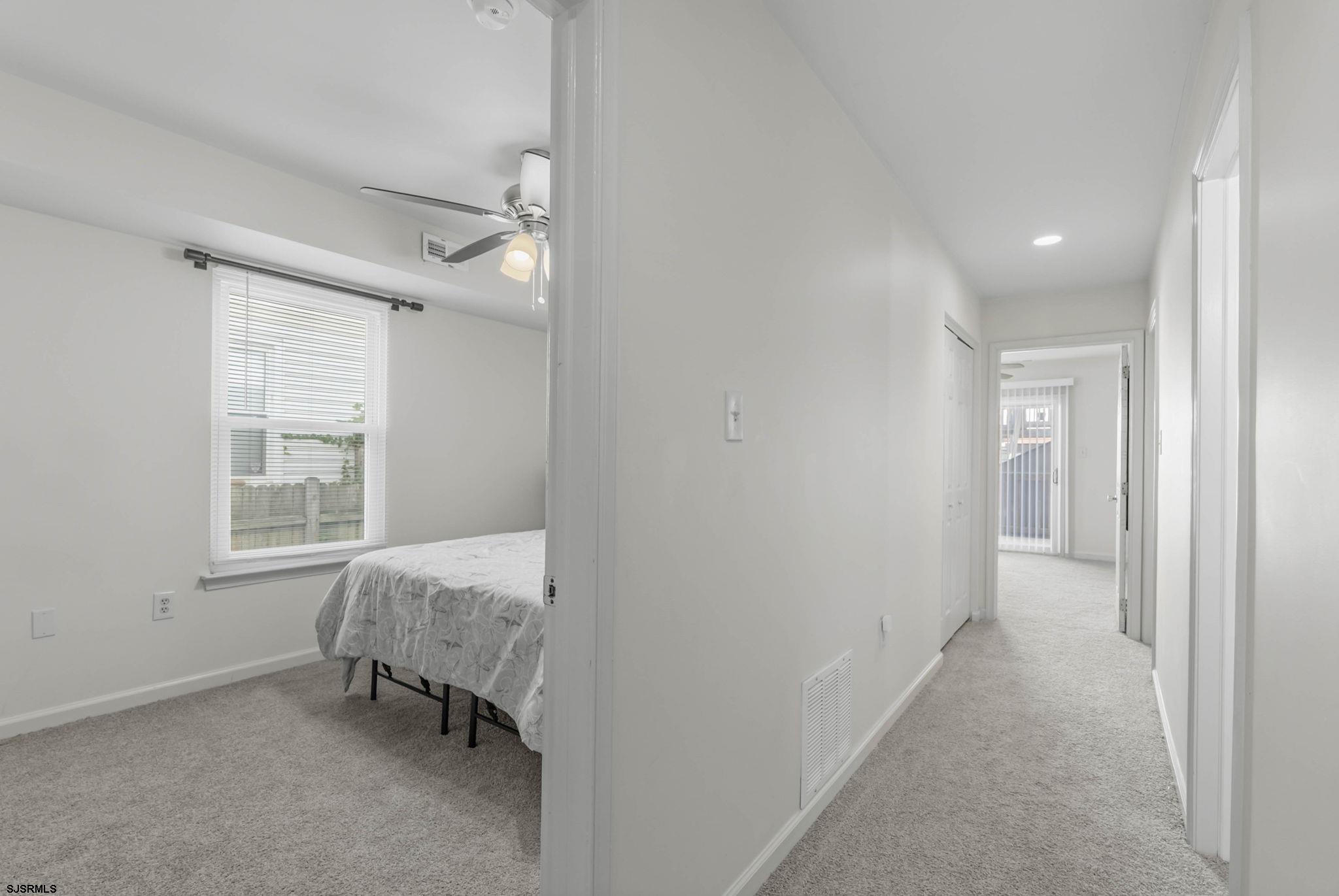 413 West Beach Avenue, Unit B Brigantine, NJ 08203 - Photo 7 of 30 a view of room with window and a ceiling fan