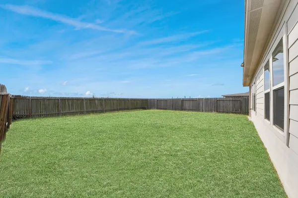 a view of outdoor space and yard