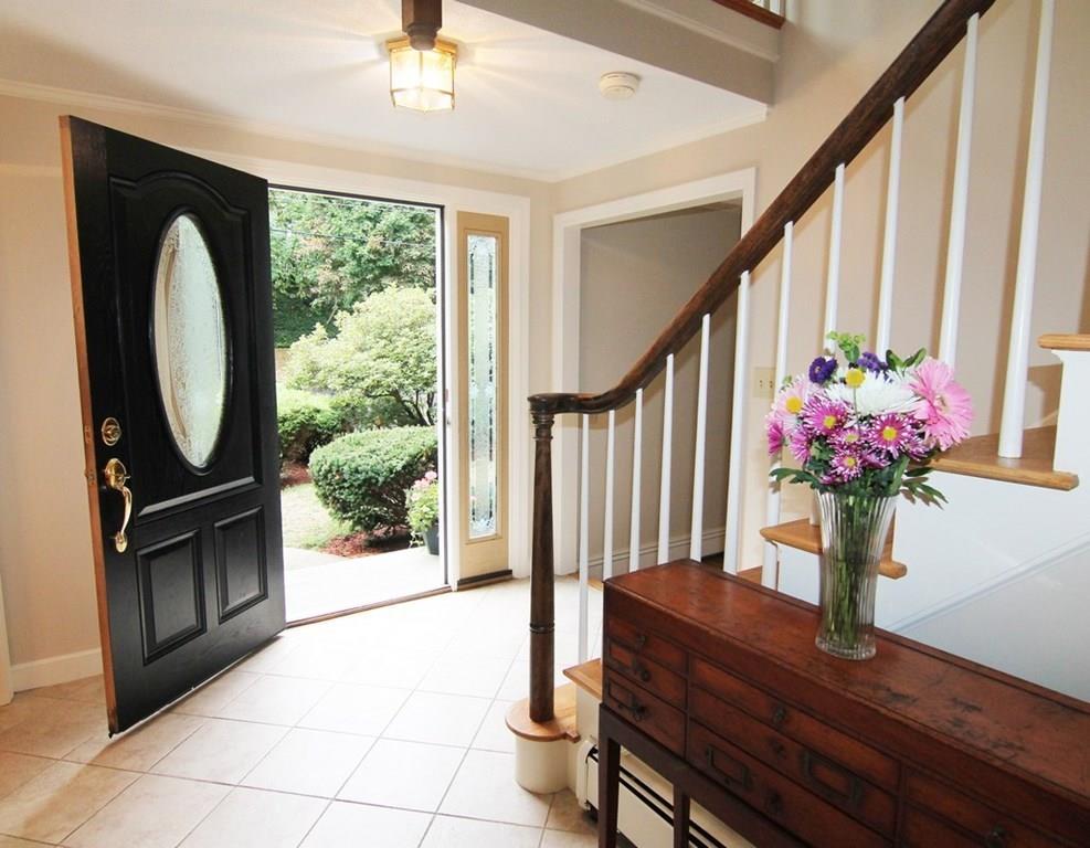 4 Paddock Lane Lexington, MA 02421 - Photo 3 of 25 a view of entryway with wooden floor and interior