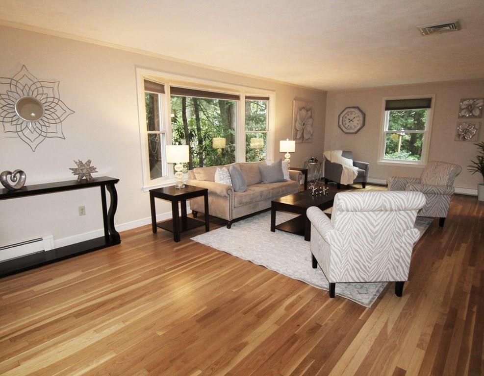 4 Paddock Lane Lexington, MA 02421 - Photo 4 of 25 a living room with furniture and a window