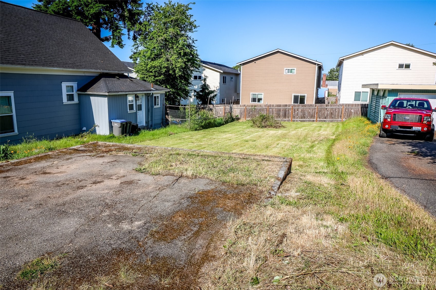 0 Scott Avenue Bremerton, WA 98310 - Photo 12 of 23 a front view of house with yard and trees