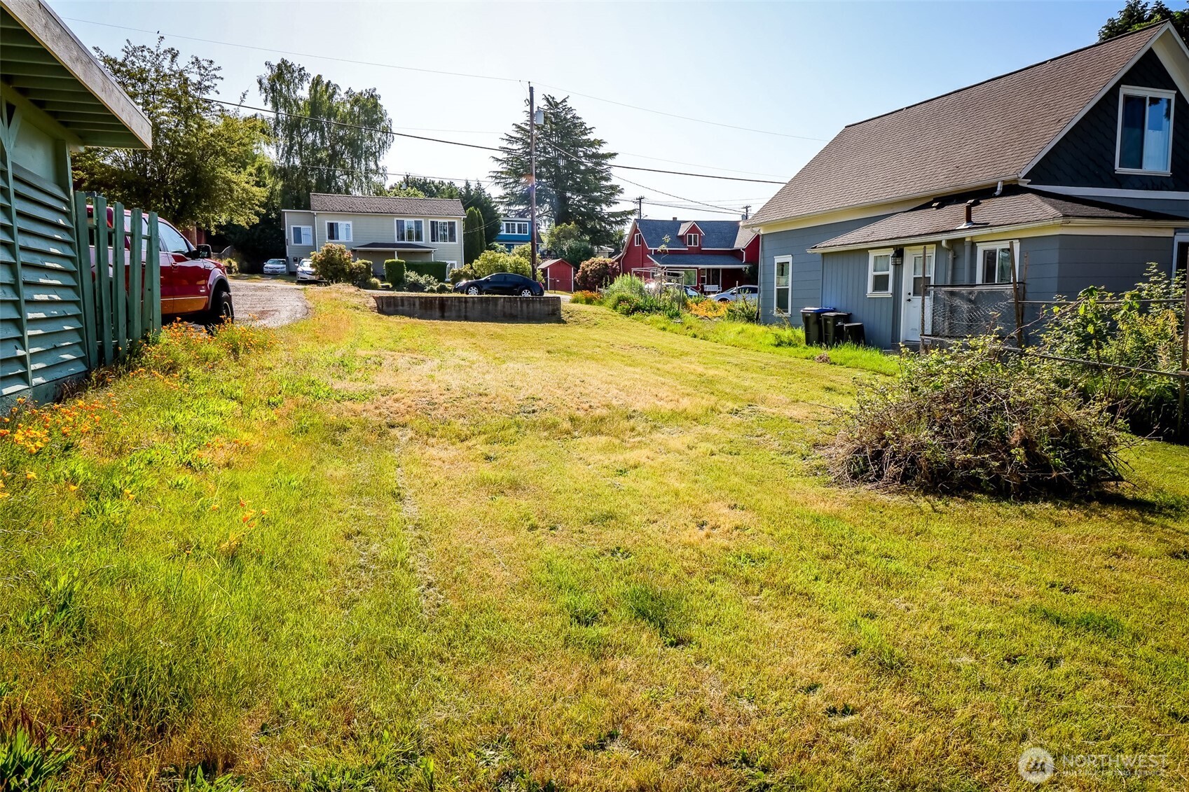 0 Scott Avenue Bremerton, WA 98310 - Photo 13 of 23 a view of a swimming pool with a garden and plants