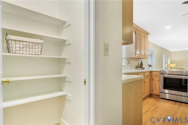 a view of cabinets and window