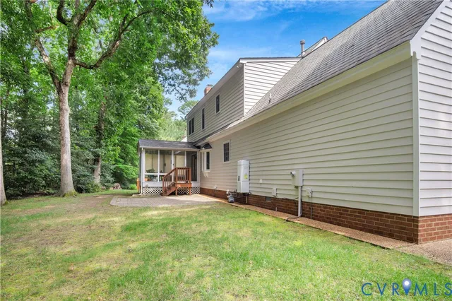 a backyard of a house with seating space