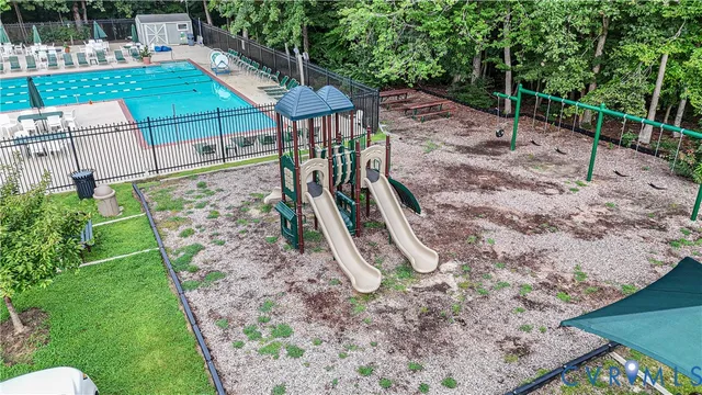 an aerial view of a house having yard