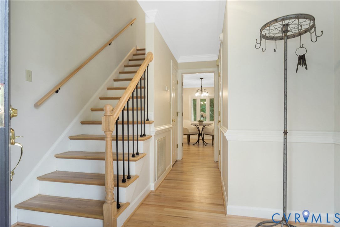 140 Seton Hill Road Williamsburg, VA 23188 - Photo 4 of 40 a view of a hallway with wooden floor and entryway