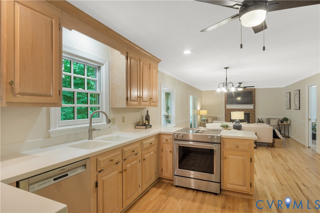 140 Seton Hill Road Williamsburg, VA 23188 - Photo 6 of 40 a kitchen with a stove a sink and cabinets