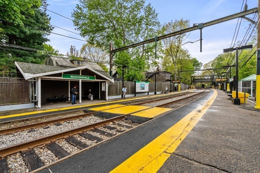 135 Beaconsfield Road, Unit 2 Brookline, MA 02445 - Photo 13 of 33 a view of a house with a swimming pool