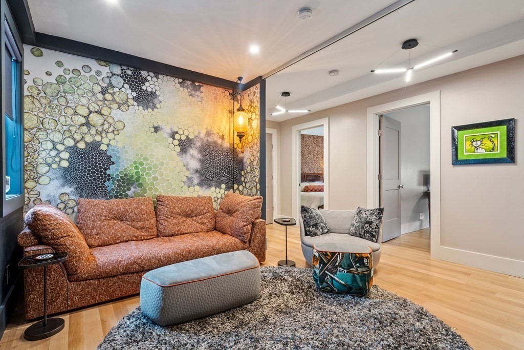135 Beaconsfield Road, Unit 2 Brookline, MA 02445 - Photo 24 of 33 a living room with furniture and a large window