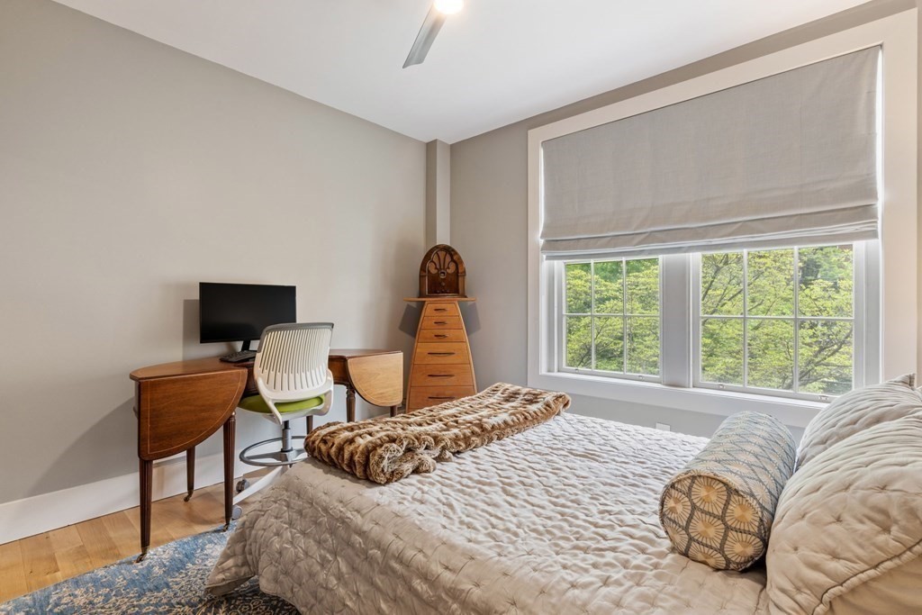 135 Beaconsfield Road, Unit 2 Brookline, MA 02445 - Photo 29 of 33 a bedroom with a bed and a window